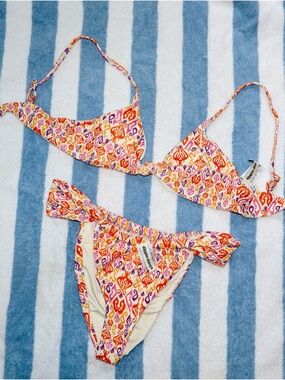 Dippin' Daisy's Pink Orange Purple Printed Bikini top and bottom